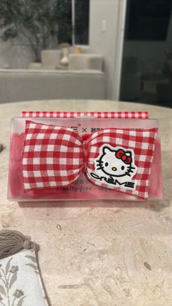The creme hello kitty plush spa headband