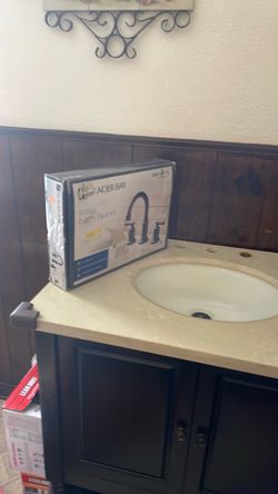 Bathroom sink with bath faucet .