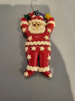 🎅 Silvestri Whimsical Santa Christmas Ornament – Stars & Colorful Garland