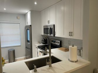 Kichen Cabinet/ Countertop/ Laminate Flooring And Closet 