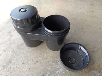 New container for used car oil filters.