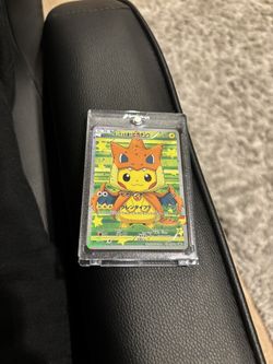 Poncho Wearing Pikachu Charizard