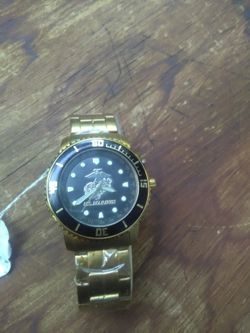 U.S. Marine corps gold tone watch.