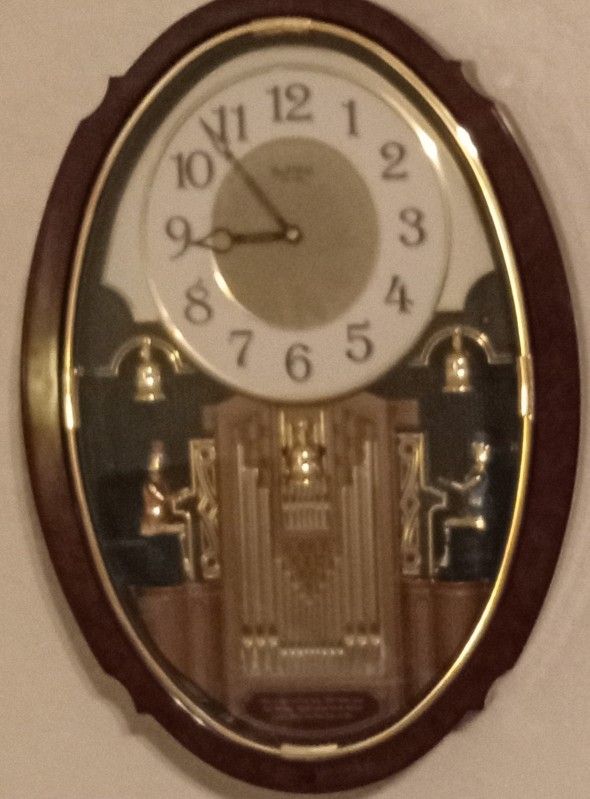 Clock "Small World Rhythm"