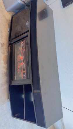fireplace it’s perfectly working only 1 door is missing the fireplace has color mode it also has speakers 🔊 got it few years ago am moving that’s why