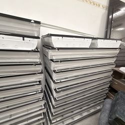 Stack of Metal Drawer Frames – Ready for Assembly