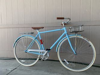 City bike STATE Bicycle Company Single Speed Commuter Sky Blue with Basket, cup holder and bottle opener