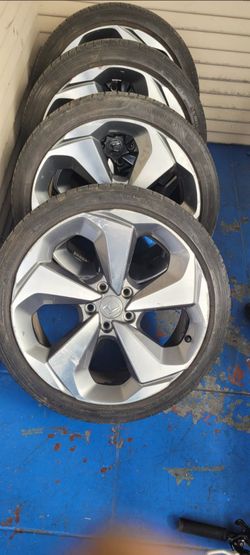4 Honda or Acura suv tires and rims