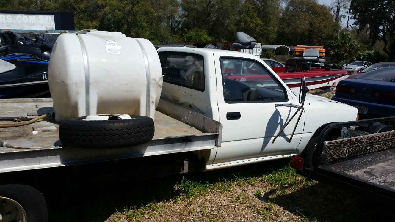 93 Toyota flatbed pressure washer truck