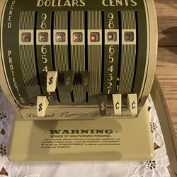 Antique check writing machine with key