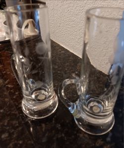 Pair of vintage etched shot glasses