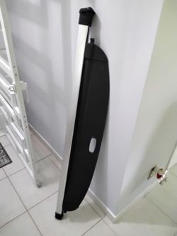 Elastic cargo cover trunk
