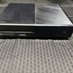 Black Xbox One Console and Controller 