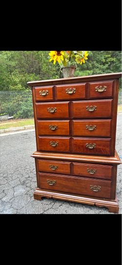 American drew solid wood tall chest with big drawers. Drawers sliding smoothly