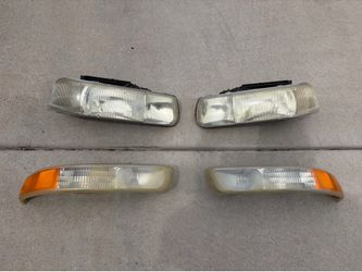 99-06 GM Chevy Silverado factory OEM headlights and front marker turn signal lights