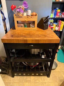 Butcher block with drawers and shelving