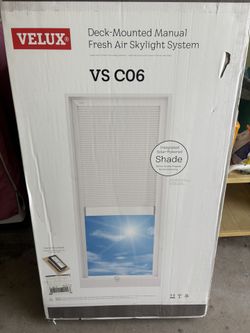 Velux Manual Venting Deck Mount Skylight  22x46in. With Solar Powered Darkening Shade
