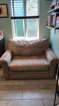 Small sofa with a pullout twin bed