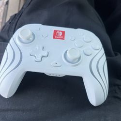 Nintendo Switch With Port, 2 Controllers, 2 Joysticks And The Console Itself 