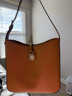 2 Beautiful hand bag- Michael Kors and Tommy Hilfiger