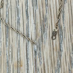 This vintage necklace is produced by the American Jewelry Chain Company (AJC) and features 1/20 12K gold-filled construction