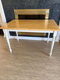 Solid wood dining table 30” H X 48” L goog condition