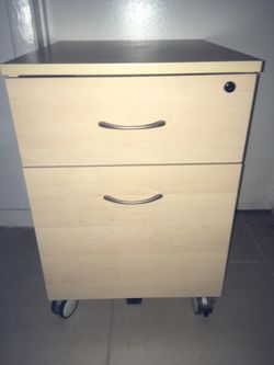 Rolling, locking wood file cabinet