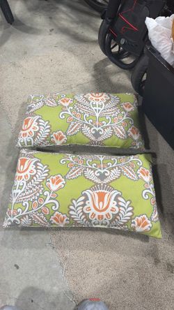 Outdoor orange and green lumbar pillows both for $15