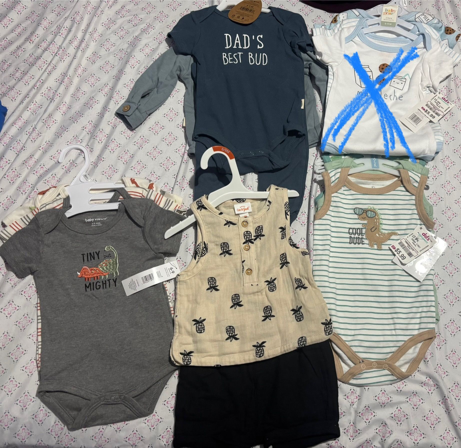 Pregnancy Pillow And Brand New Baby Clothes