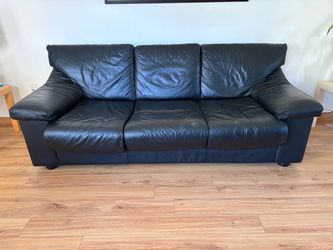 IKEA Black Leather 3-Seat Sofa with bed. $100