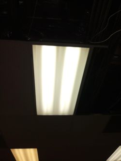 Commercial lighting for acoustical ceiling