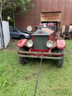 1927 American LaFrance Fire Truck(MUSEUM CONDITION ), With Wood Ladders, Solid Brass Bell, Hoses, Etc.