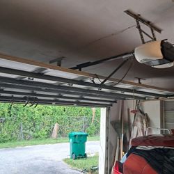 Overhead Garage Door Spring Opener Off Track Adjustments Replace And Parts