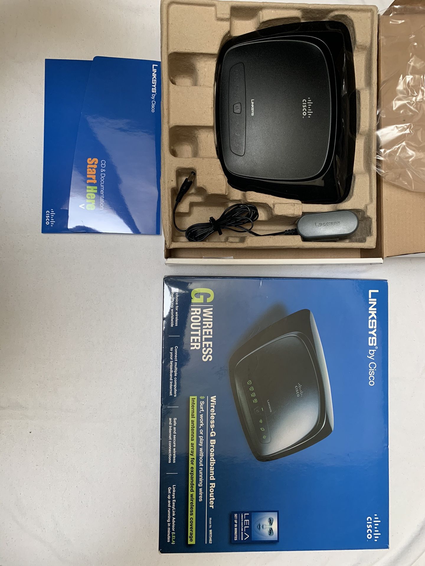 Linksys by Cisco Wireless-G Broadband Router Model No.: WRT54G2