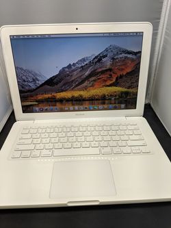 Apple MacBook 13" 2.4ghz 250gb late 2009 4gb ram with Photoshop cs6 master collection +with office