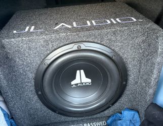 A JL Audio BassWedge slot-ported loaded subwoofer enclosure and  Kenwood Excelon X802-5 5-channel amplifier (Package)