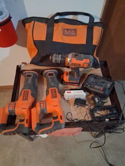 Black and decker pwer tools 2 saw saw 1 drill 3 20v lithium batteries 1 charger with tool bag