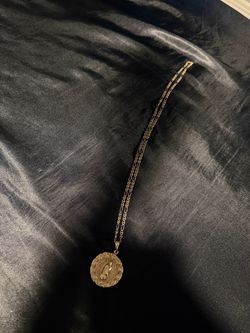 14k gold chain and 10k gold pendant