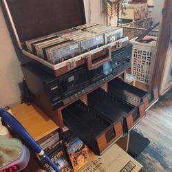 Stereo Double Cassette Deck And Two Tape Cases And Tape Cleaner 