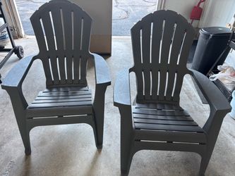 2 plastic adirondack chairs