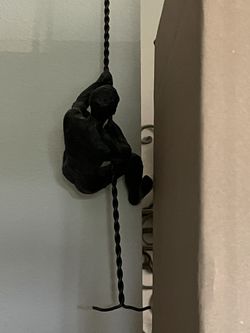 Sculpture  Man Climbing Rope