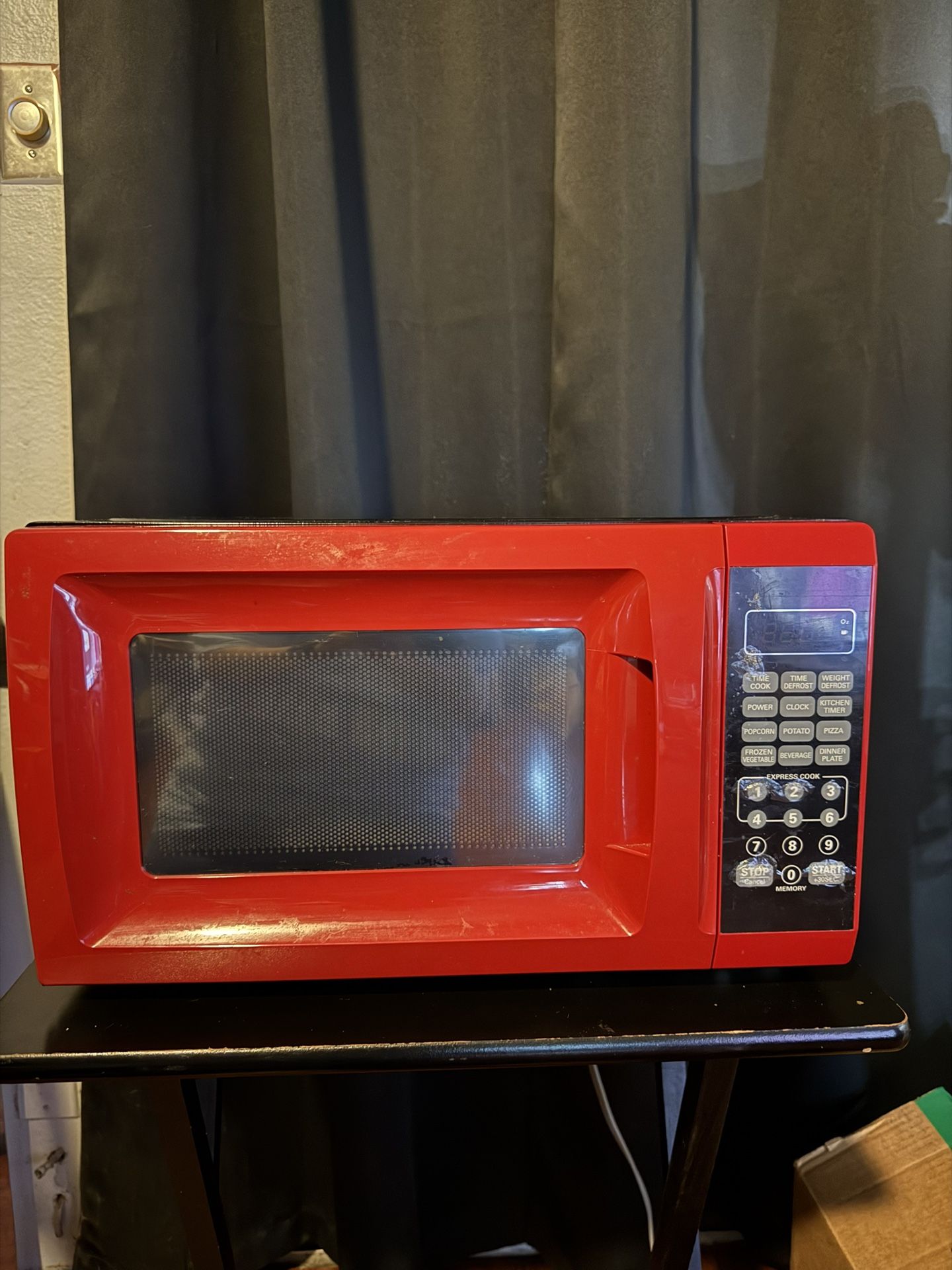 Red 700 Watts Microwave