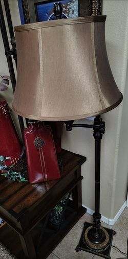 Beautiful reach adjustable Floor Lamp.  Oil rub browns.