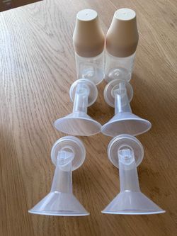 Spectra s1 breast pump Accessories. Including 4 flanges, 2 bottles Great condition.Gently used.