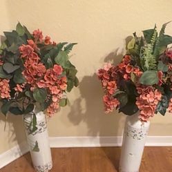 Fake Floral Arrangements In Matching White Distressed Tall Vases