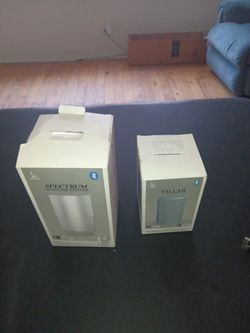 Two Speakers and a set of ear buds Bluetooth ready