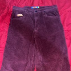 Red corduroy jeans
