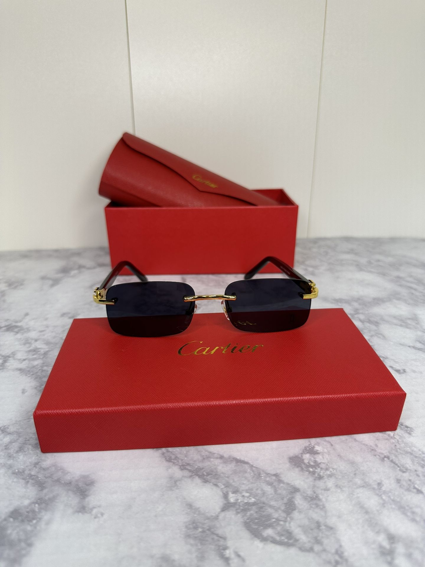 Cartier Black and Gold Shades