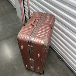 Pink Suitcase On Wheels