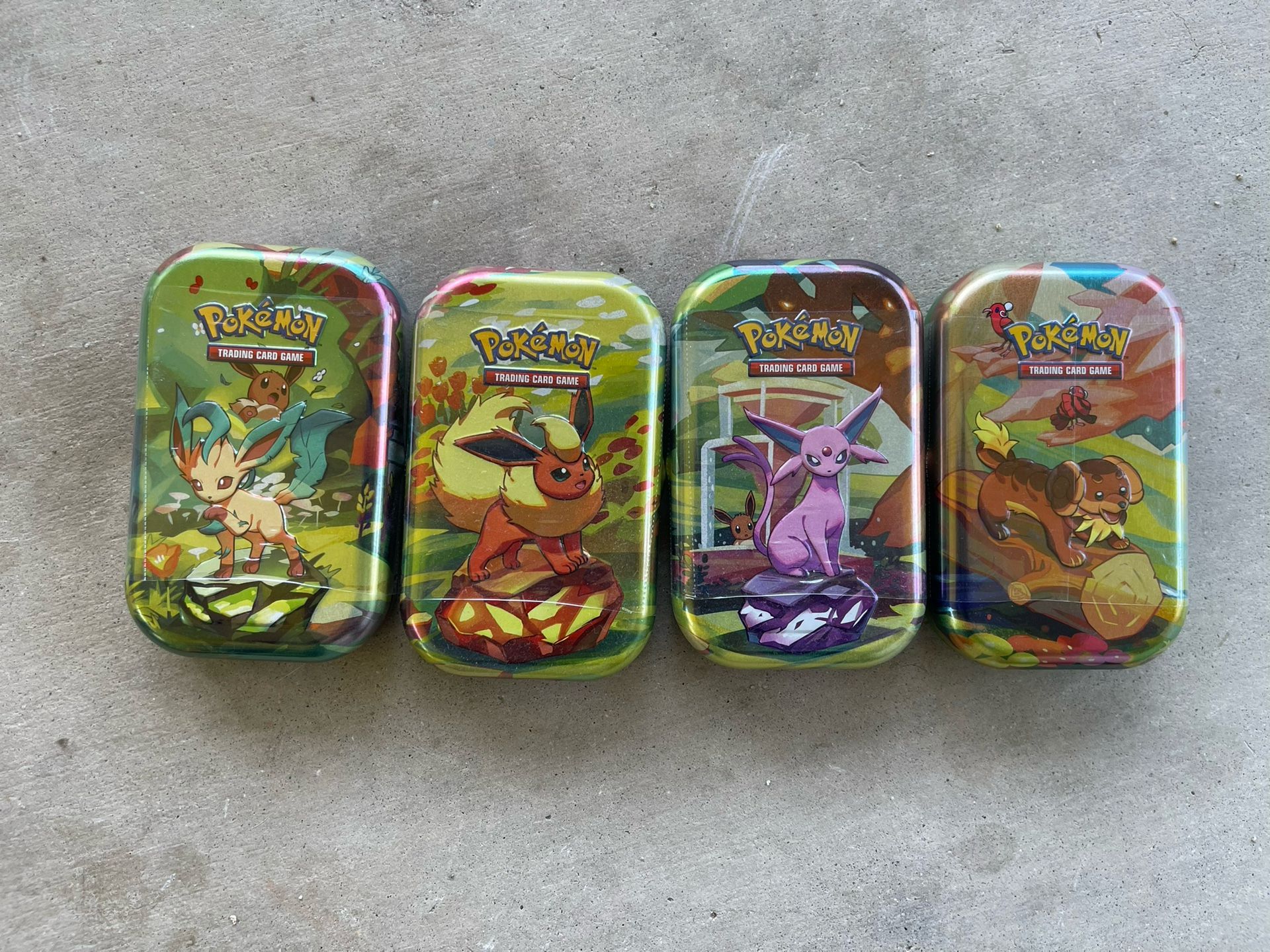 POKEMON SV8.5 PRISMATIC EVOLUTION MINI TINS